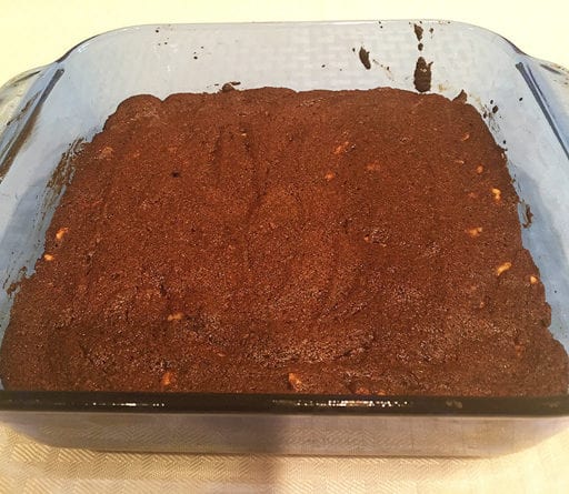 Keto Low carb fudge brownies just out of the oven. Sooth your chocolate craving with this Keto Low Carb Fudge Brownies Recipe. They are deeply chocolate,chewy and easy to whip up. Brownies are just 1.5 net carbs each.