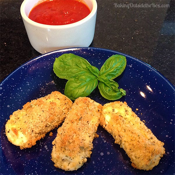 #bakingoutsidethebox | These Easy Low Carb Baked Mozzarella Sticks are my fuss-free way to make a favorite restaurant treat at home.