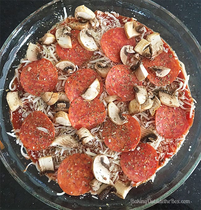 This recipe for Keto Pizza Dip is so easy and good you'll serve it at parties to friends but wish you had it all to yourself. 3 net carbs per serving.