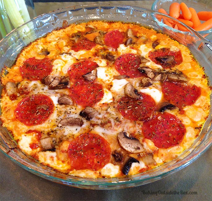 This recipe for Keto Pizza Dip is so easy and good you'll serve it at parties to friends but wish you had it all to yourself. 3 net carbs per serving.